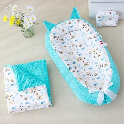 réducteur-de-lit-bébé-cocon-turquoise