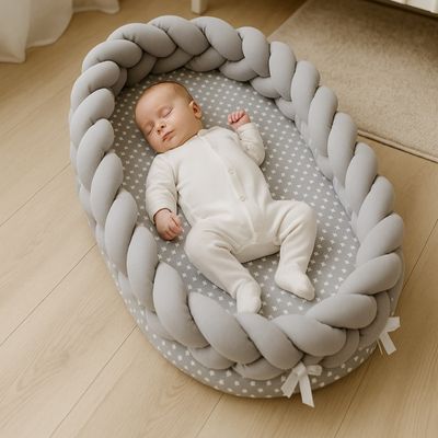 cocon-bébé-tressé-gris-étoiles