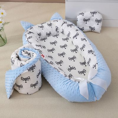 cocon-douillet-réducteur-de-lit-bébé-bleu-confortable-et-portable