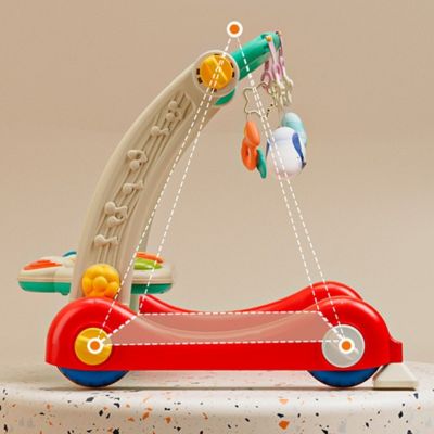 detail-trotteur-bebe-structure-triangulaire-anti-basculement-et-roues-en-caoutchouc