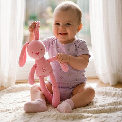 Doudou lapin rose utilisable pour un tout petit